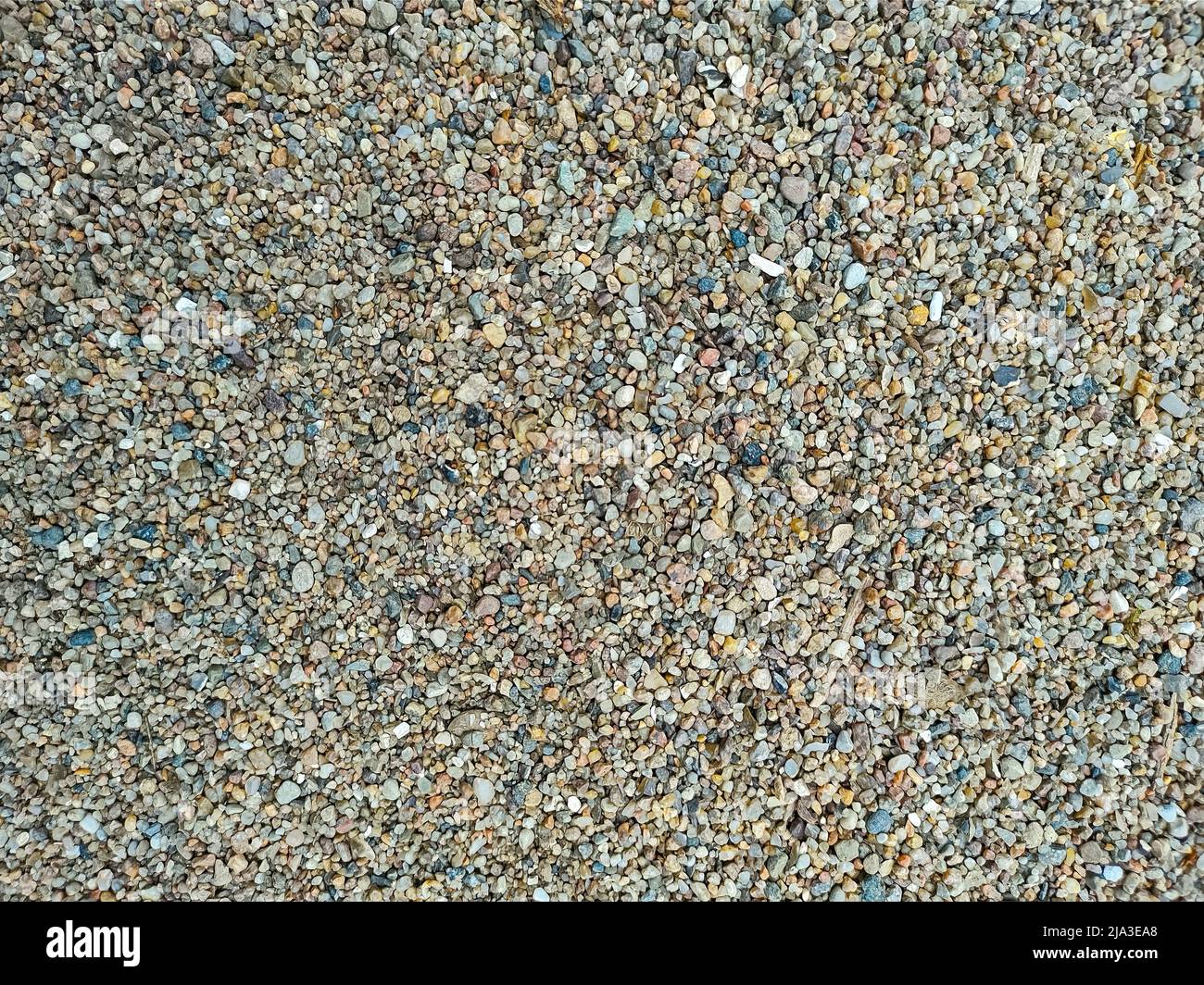 gravel background, top down view of fine colorful gravel Stock Photo