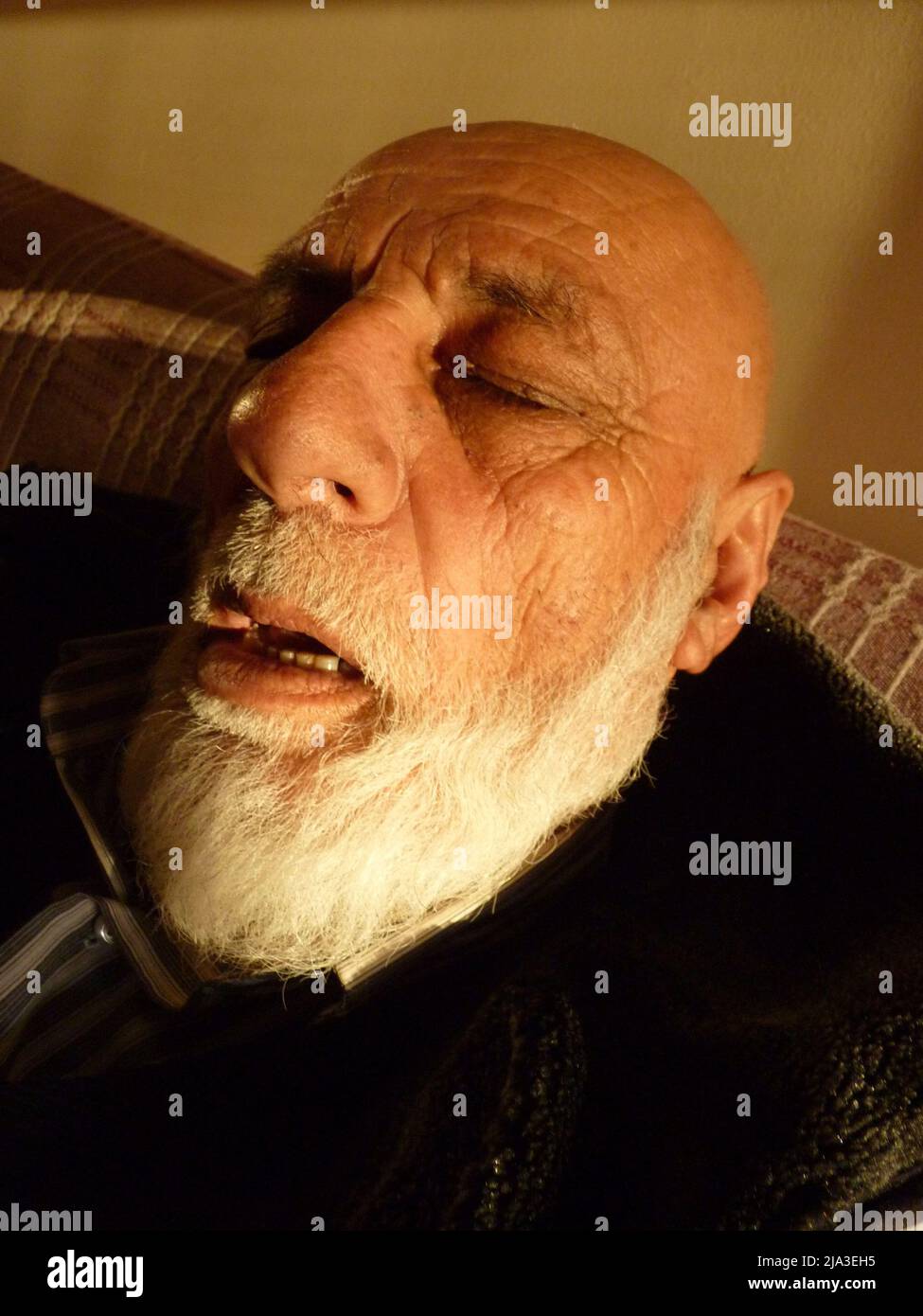 old retired man napping with sunlight on his face Stock Photo - Alamy