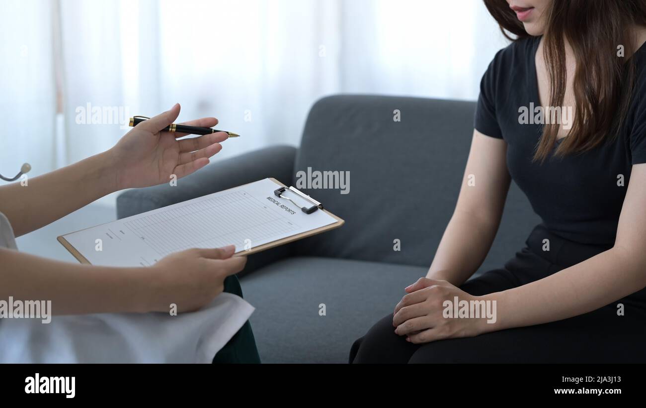 Professional psychologist explaining diagnosis, giving advice to