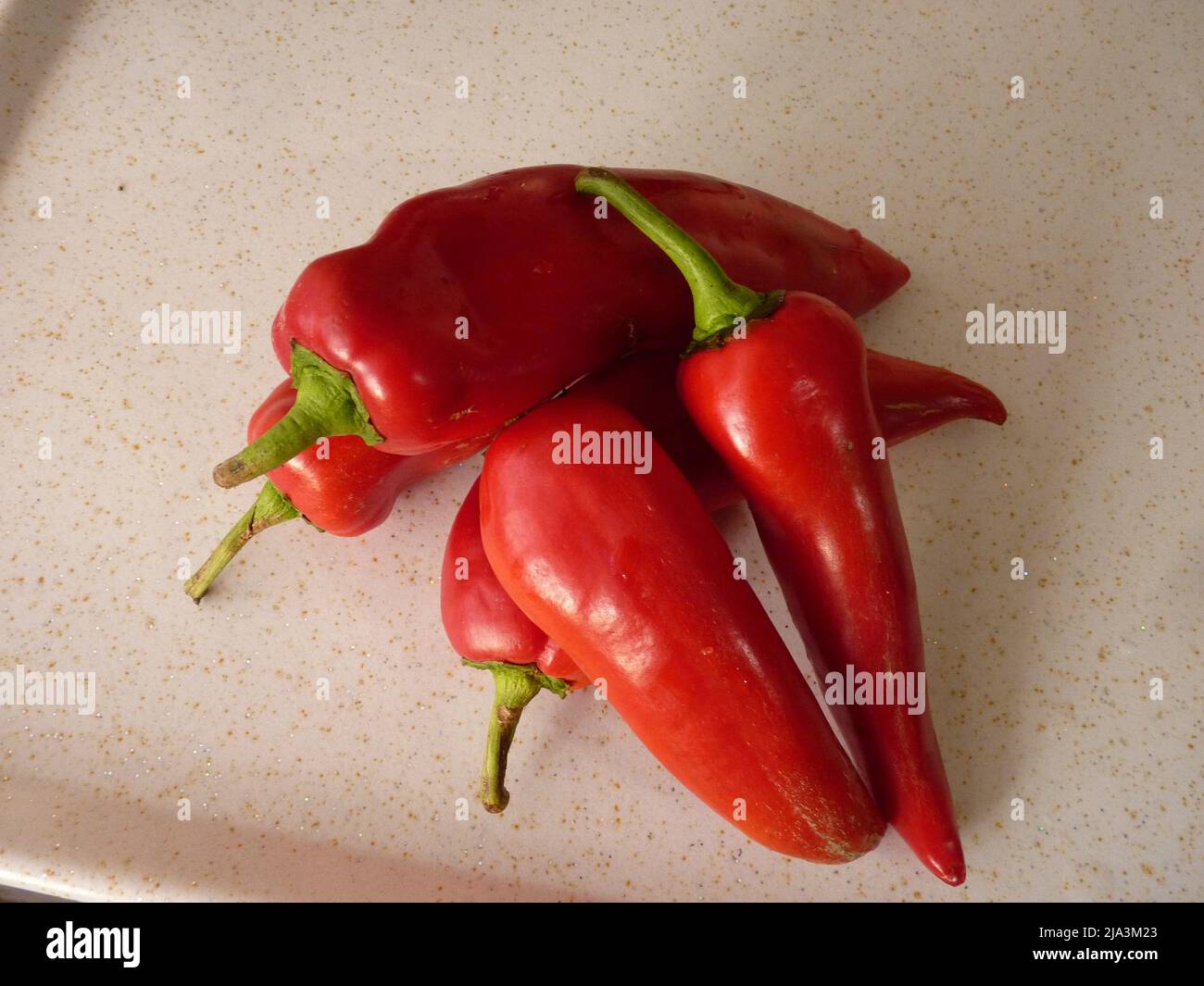 Top view of recently harvested paprika or capia pepper background Stock Photo