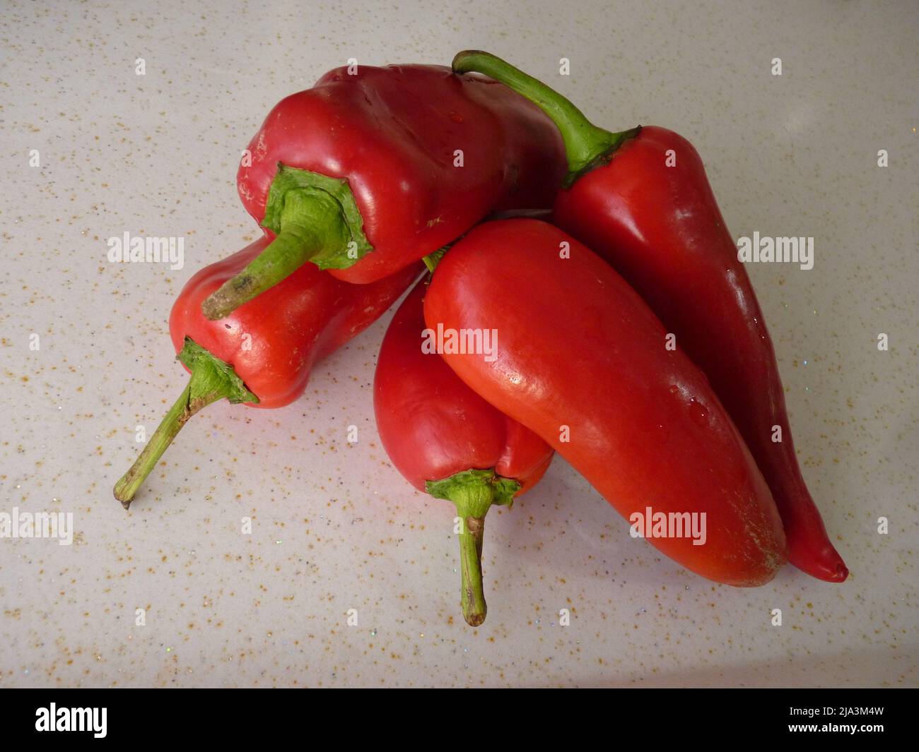 Top view of recently harvested paprika or capia pepper background Stock Photo