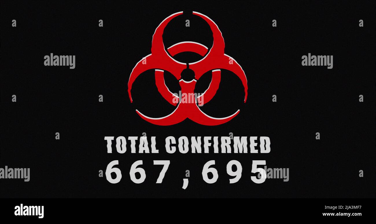 Image of a red health hazard sign with a word Total Confirmed on black background. Stock Photo
