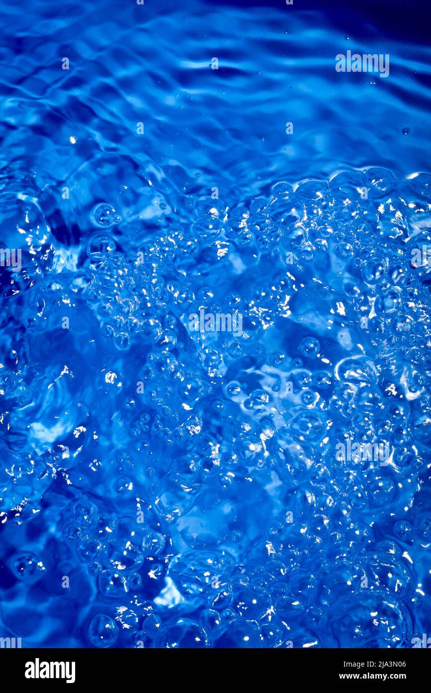 Dark blue water background with splashes and bubbles Stock Photo Alamy