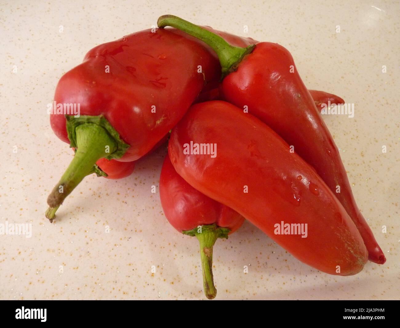 Top view of recently harvested paprika or capia pepper background Stock Photo