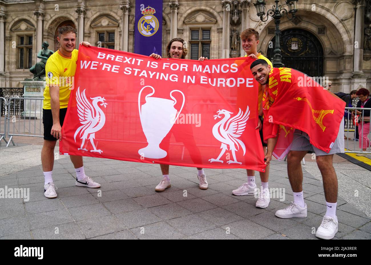 Liverpool fans hold up a flag at the Trophy Experience at The Place de l'Hotel de Ville in Paris ahead of Saturday's UEFA Champions League Final at the Stade de France, Paris. Picture date: Friday May 27, 2022. Stock Photo
