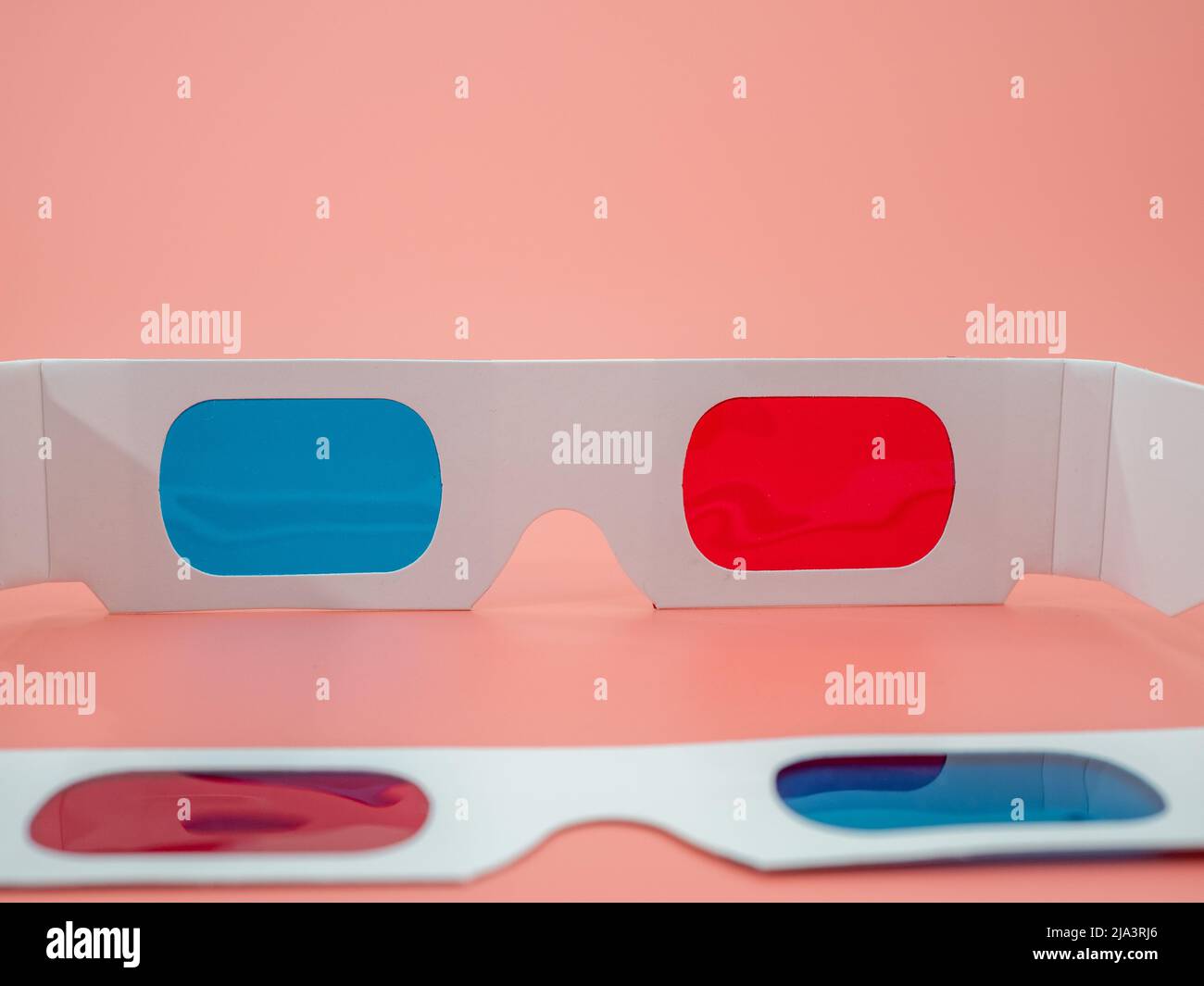 Red and blue paper glasses for viewing 3D movies and images Stock Photo
