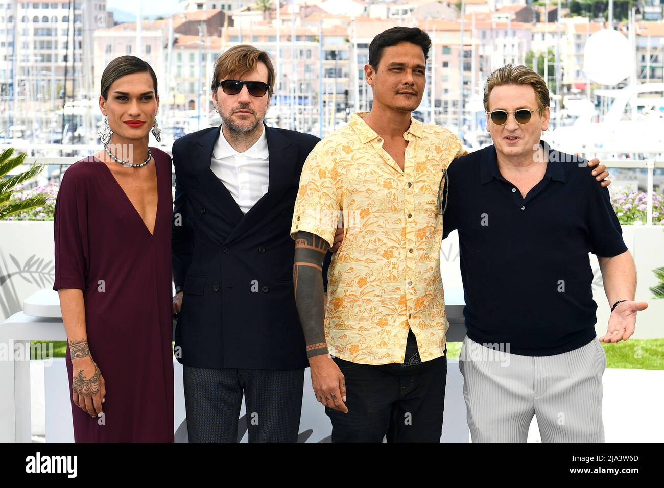 The 75th Cannes Film Festival - Photocall for the film 'Tourment sur les iles' (Pacifiction) in competition - Cannes, France, May 27, 2022. Director Albert Serra and cast members Benoit Magimel, Pahoa Mahagafanau and Matahi Pambrun pose. REUTERS/Piroschka Van De Wouw Stock Photo