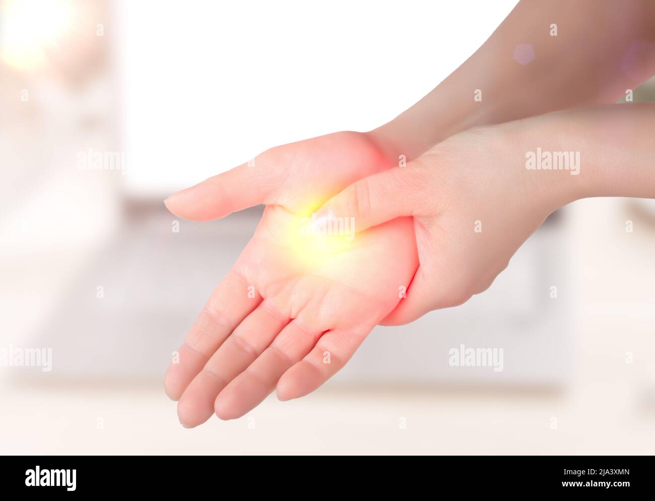 Woman holding her wrist pain from using computer. Office syndrome hand