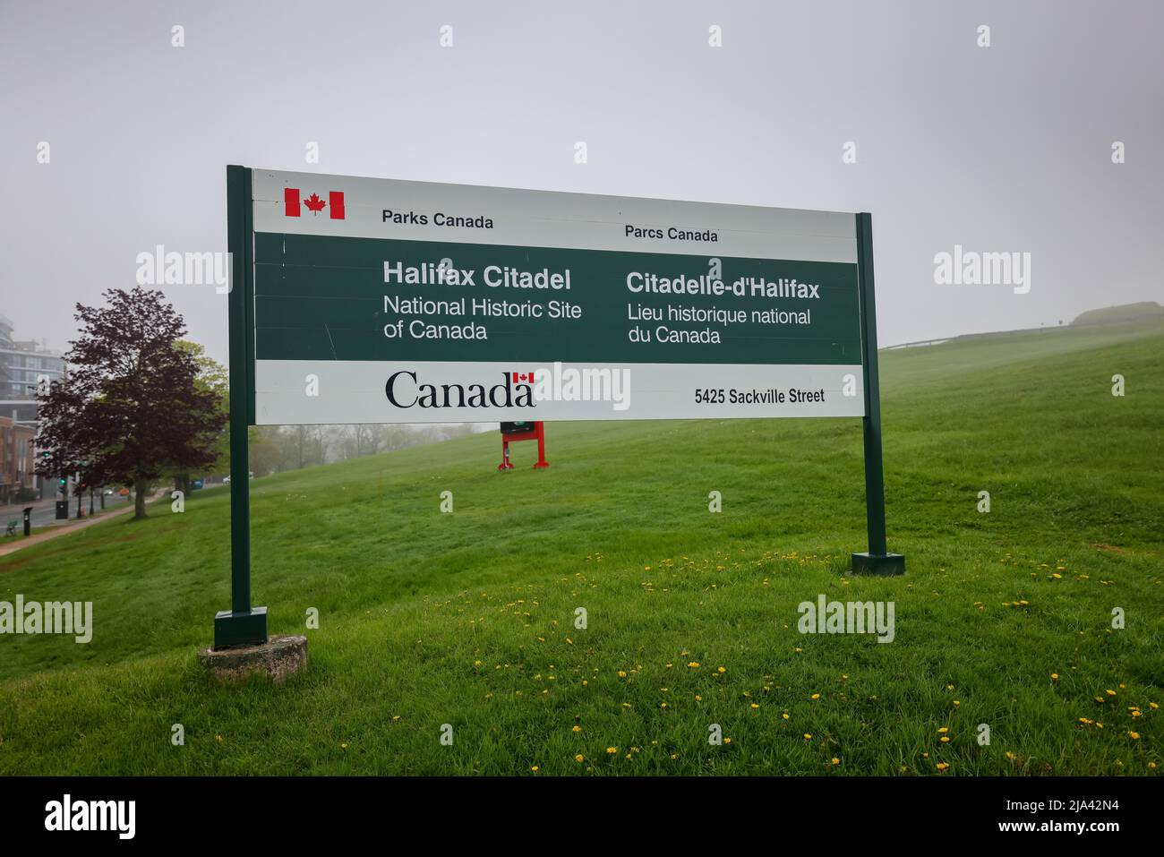 Official Parks Canada Sign Board at Halifax Citadel National Historic Site at the entrance in English and French. HALIFAX, CANADA - MAY 2022: Stock Photo