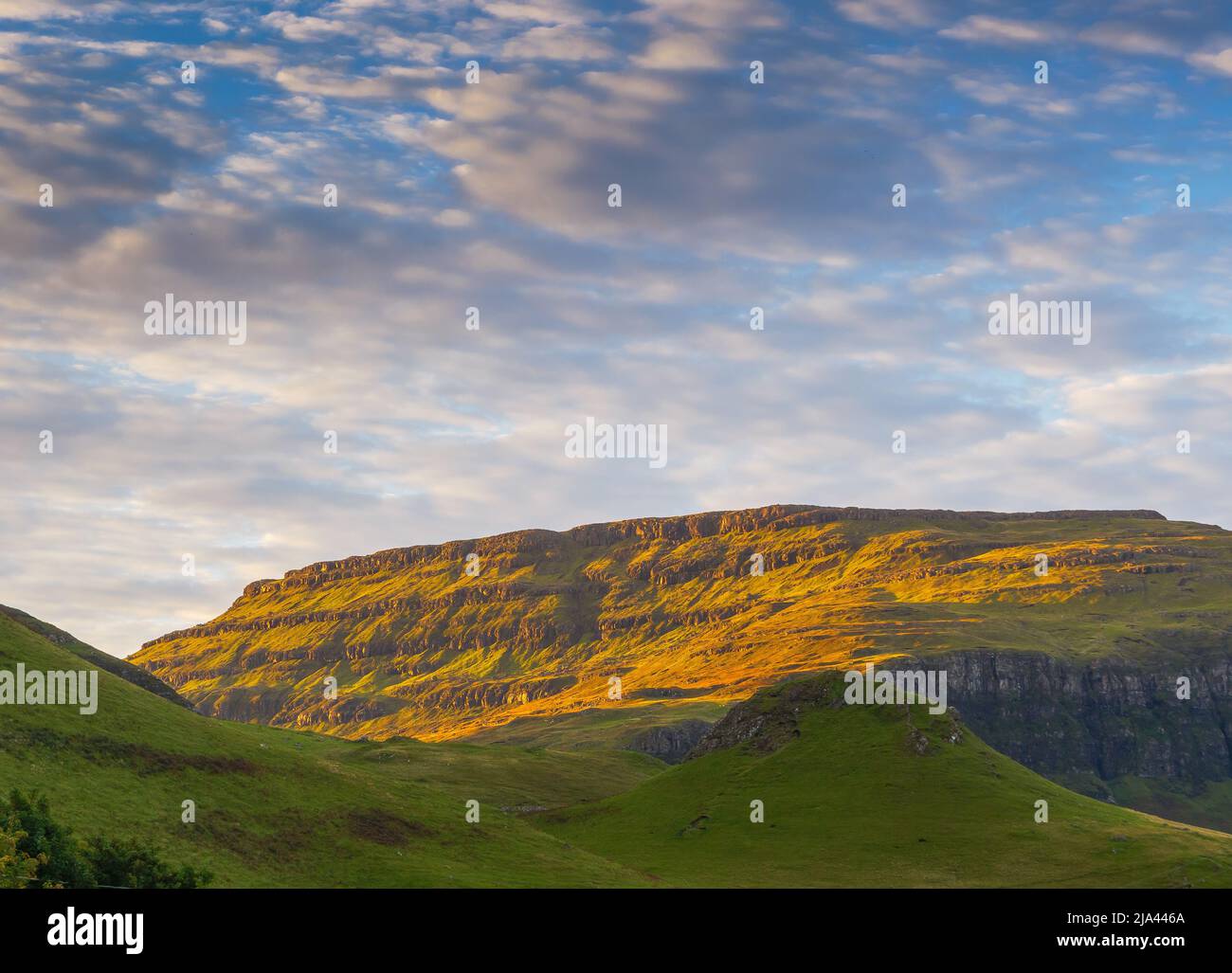 Hills at sunset on the Gribun rocks on the Isle of Mull, Highlands Scotland UK Stock Photo