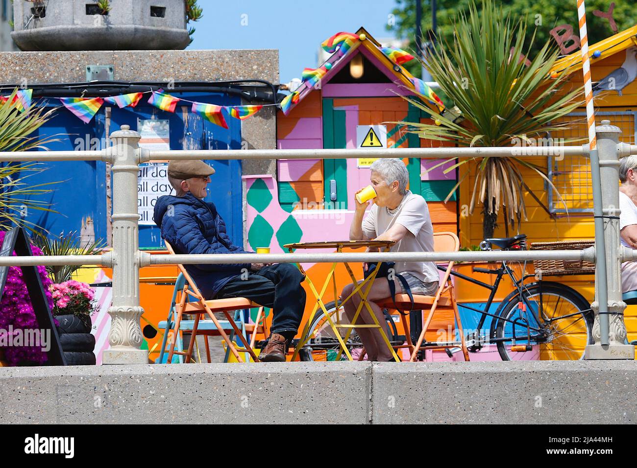 Hastings, East Sussex, UK. 27 May, 2022. UK Weather: Sunny intervals in the seaside town of Hastings in East Sussex as Brits enjoy the warm weather today along the seafront promenade. Photo Credit: Paul Lawrenson /Alamy Live News Stock Photo