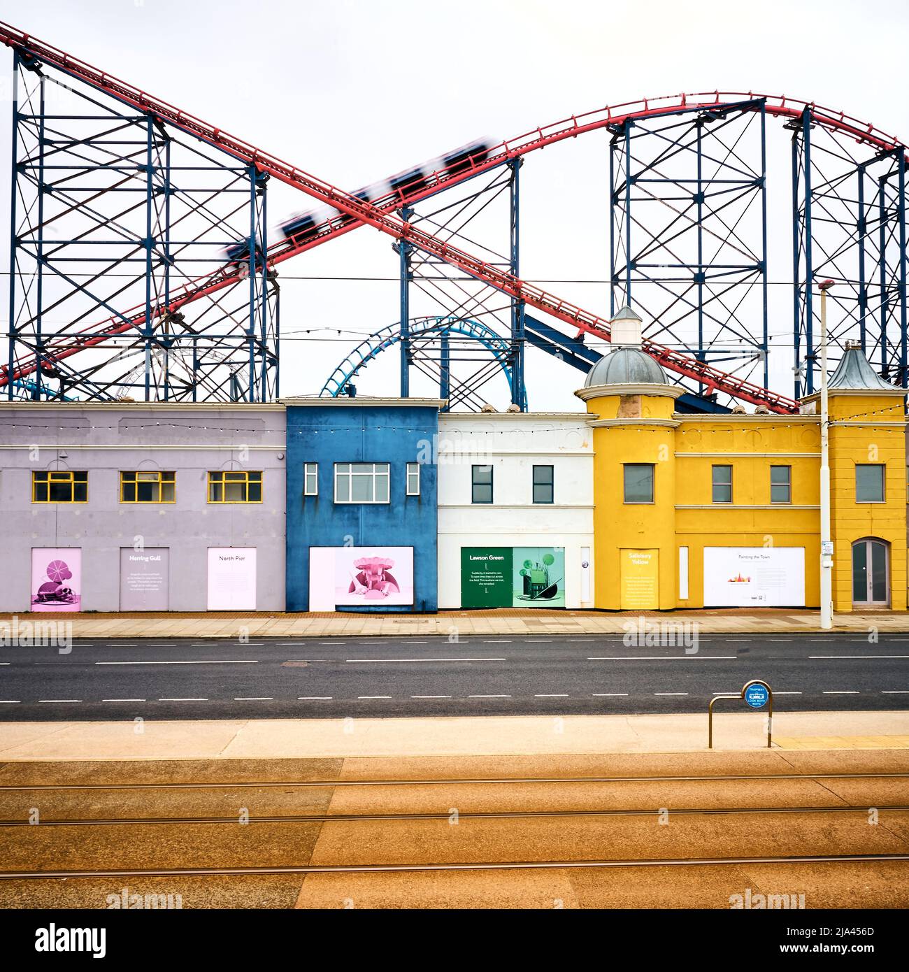 Big One roller coaster carriages passing a empty Ocean Boulevard at Blackpool Pleasure Beach Stock Photo
