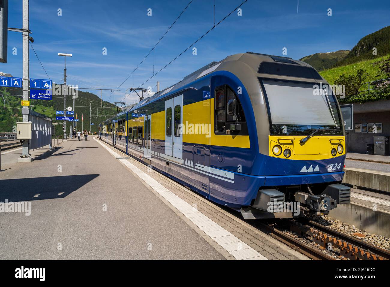 Passenger train at railway station, Grindelwald, Canton of Bern, Switzerland Stock Photo