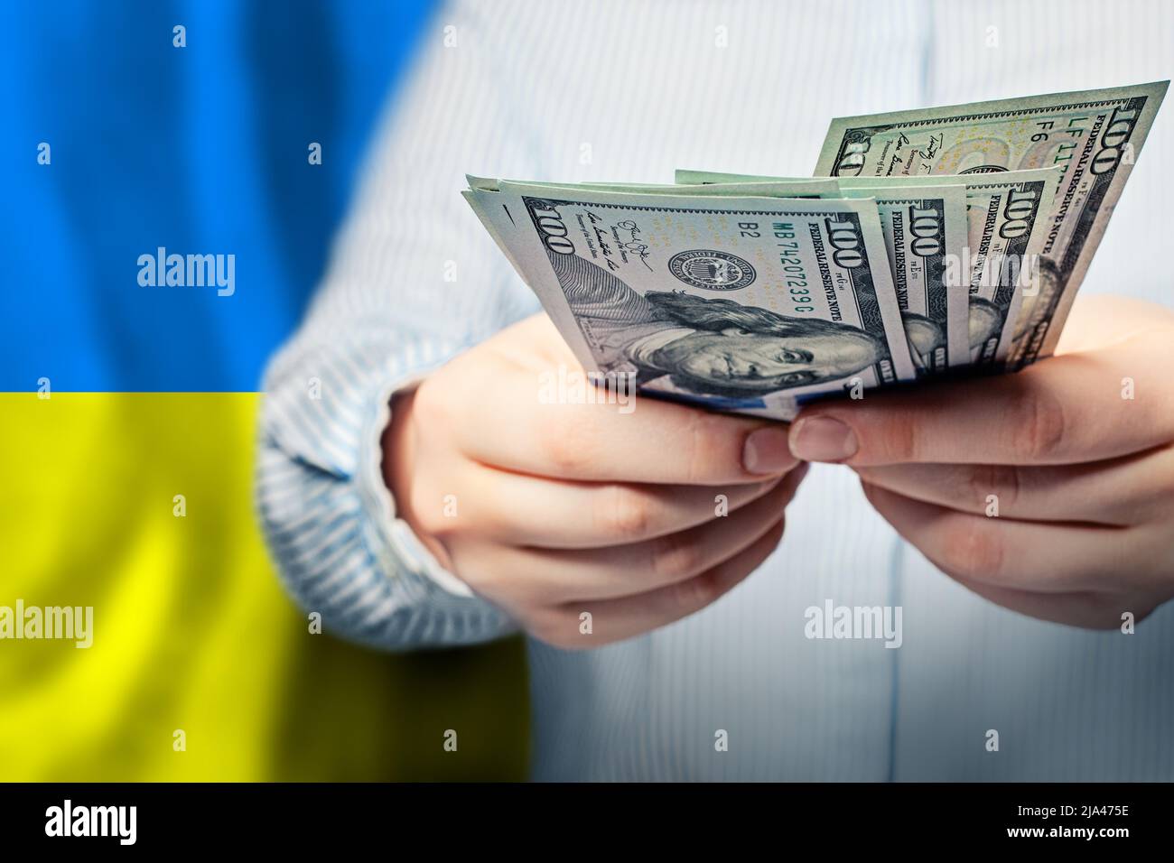 Concept of Ukrainian finanse, banking and saving money. US dollars cash