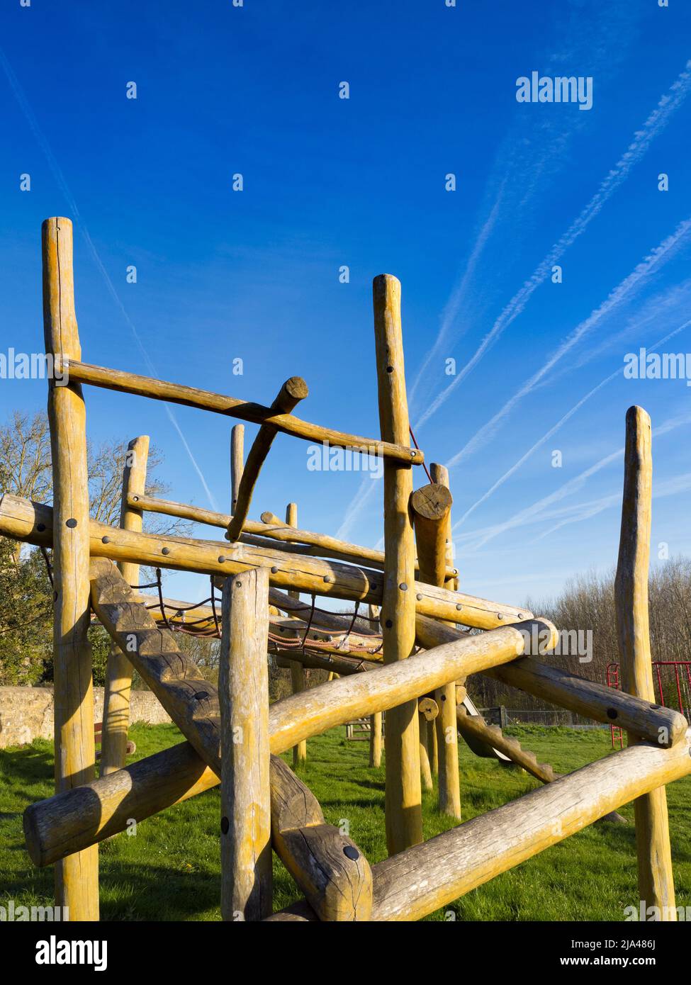 There is nothing more eerie and sad than a deserted, silent deserted playground. Here we see a climbing frame in one such in Sandford Village, just so Stock Photo