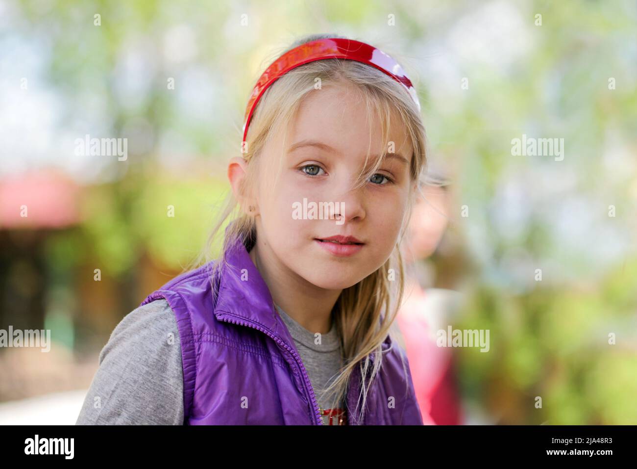 Happy child girl outdoors portrait Stock Photo - Alamy