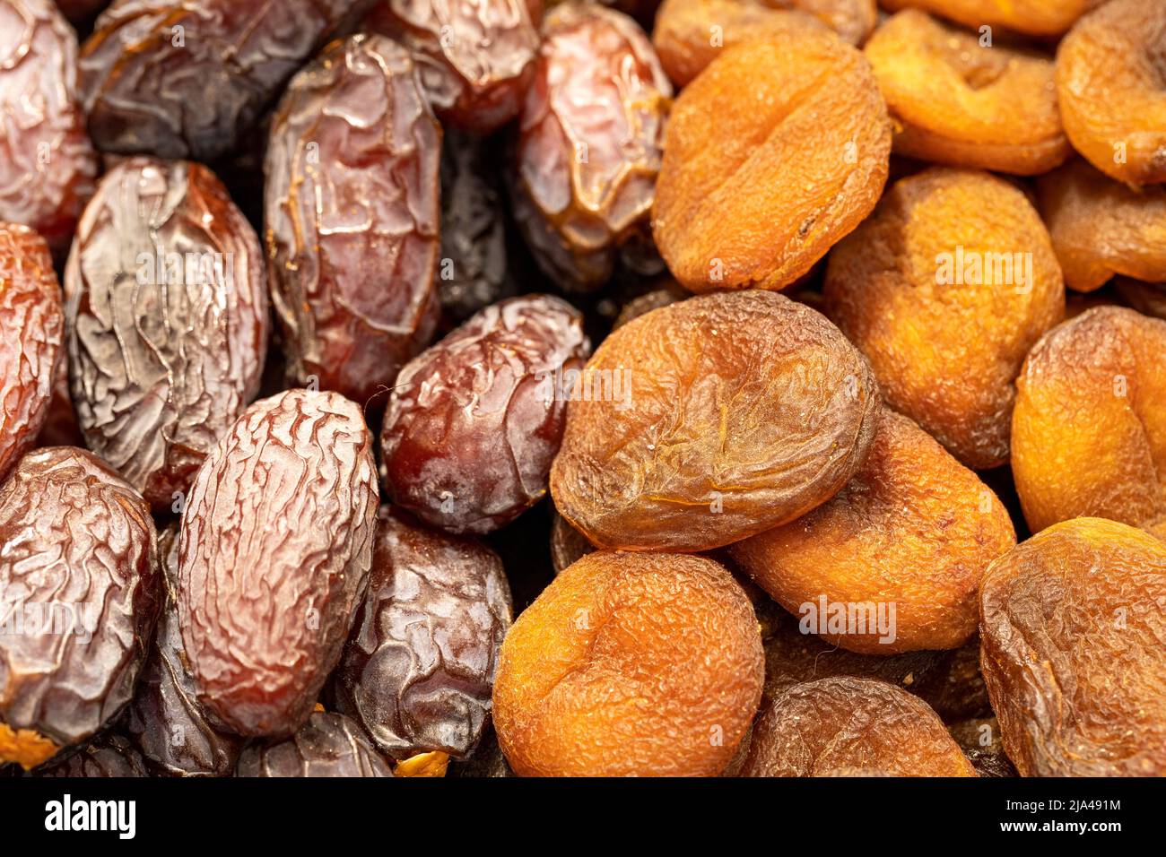 Dates fruit and dried apricots. healthy foods. Closeup Stock Photo Alamy