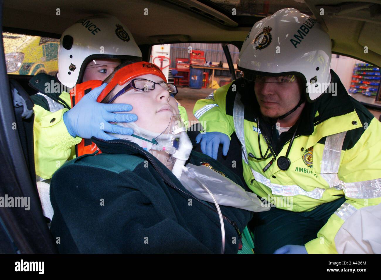 Ambulance crew treating casualty at incident, RTC, Road Traffic