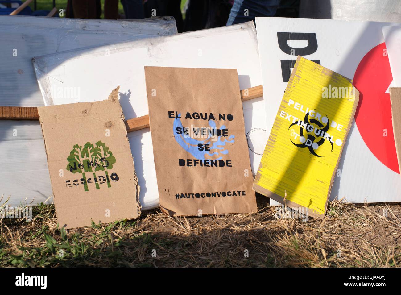Buenos Aires, Argentina; May 21, 2022: Environmental protest posters: No more ecocide. Water is not to be sold, it is to be defended. Danger of exting Stock Photo