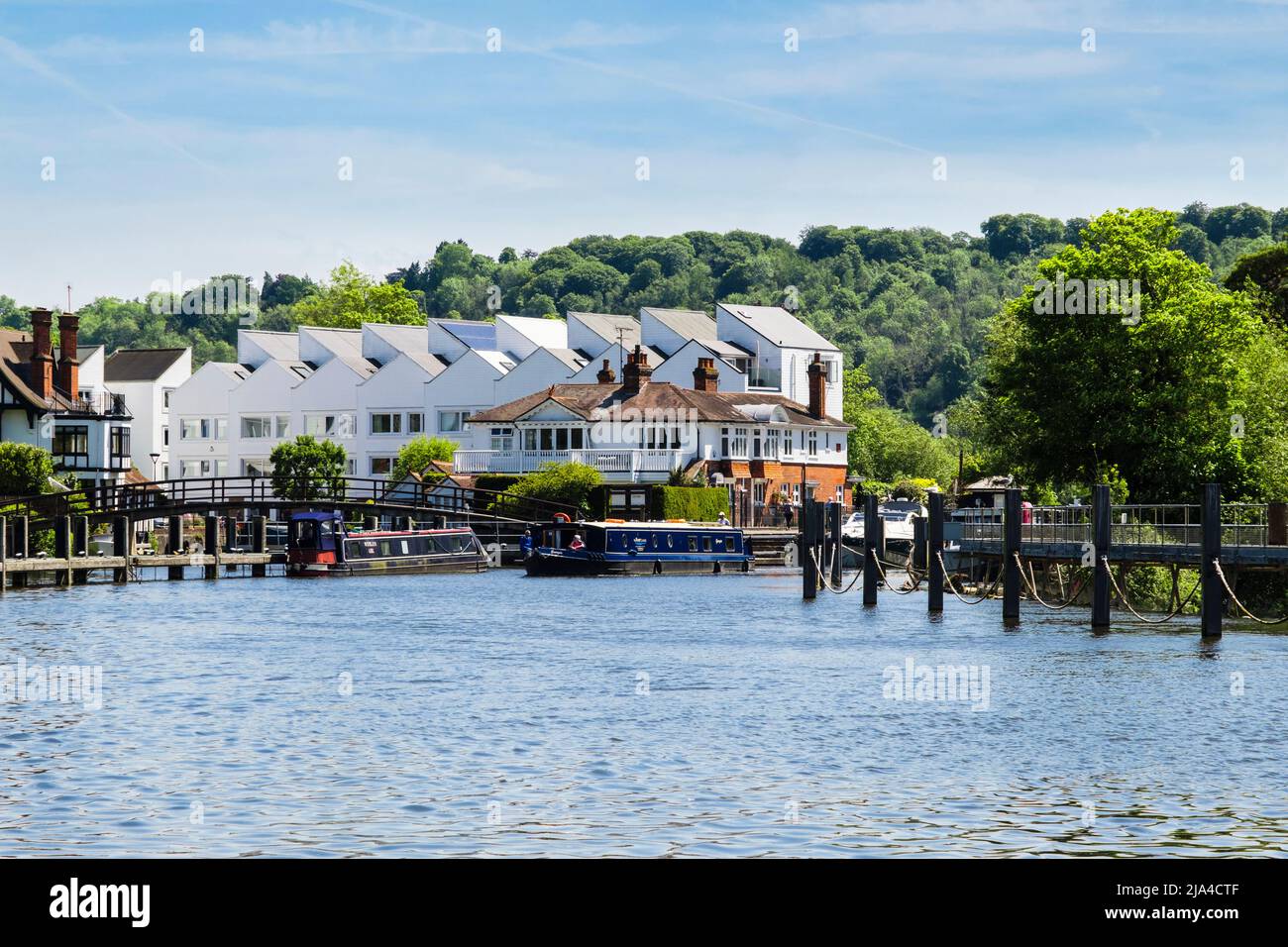 Narrowboat sailing from Marlow lock along River Thames. Marlow, Buckinghamshire, England, UK, Britain Stock Photo