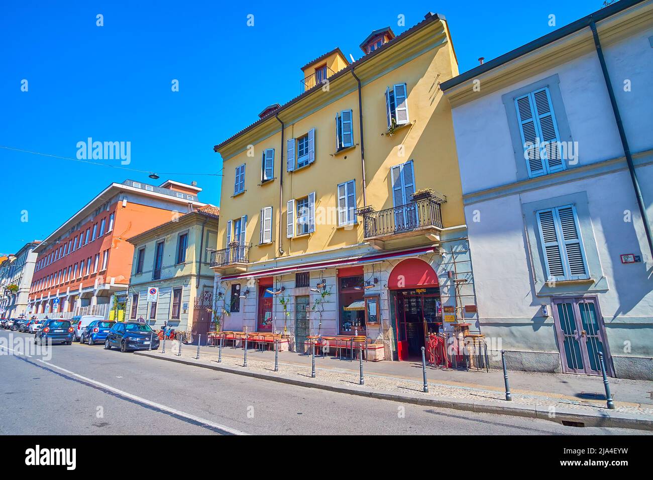 MILAN, ITALY - APRIL 5, 2022: Via San Marco street with numerous restaurants and cafe in the heart of Brera district, on April 5 in Milan, Italy Stock Photo