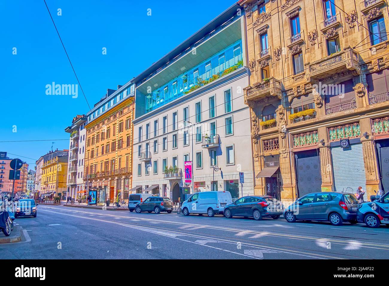 MILAN, ITALY - APRIL 5, 2022: Buildings along Viale Monte Grappa street in Porta Nuova district, on April 5 in Milan, Italy Stock Photo