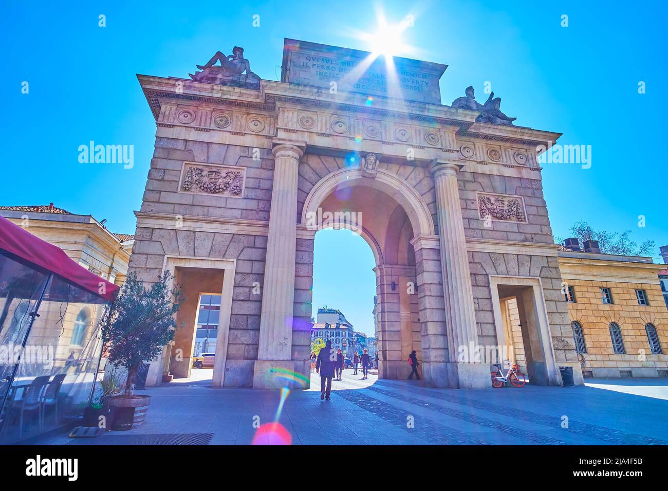 MILAN, ITALY - APRIL 5, 2022: The pleasant walk through the historical Porta Garibaldi in old town, on April 5 in Milan, Italy Stock Photo