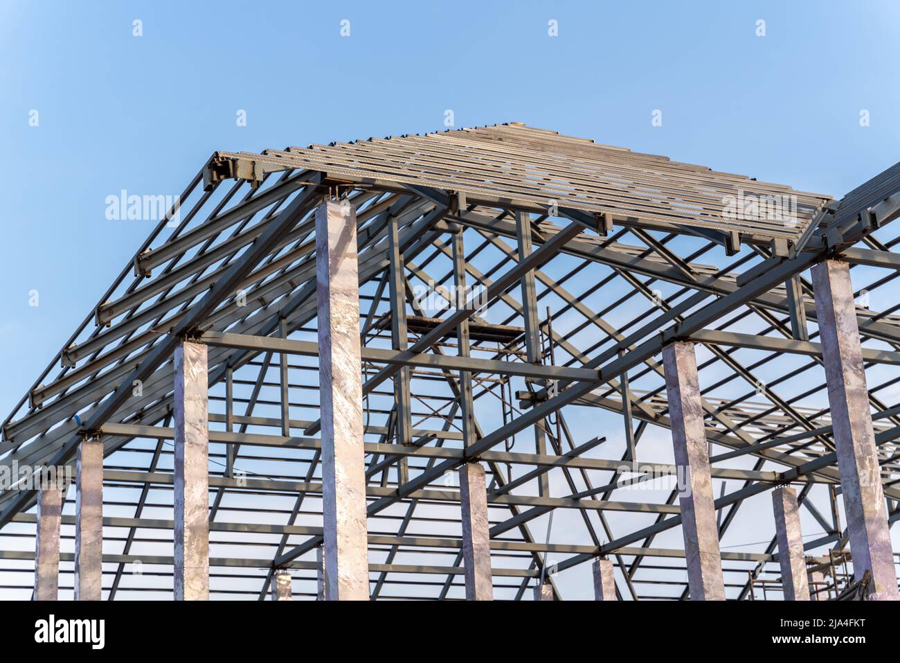 Roof structure of steel for building or house construction on sky  background Stock Photo - Alamy