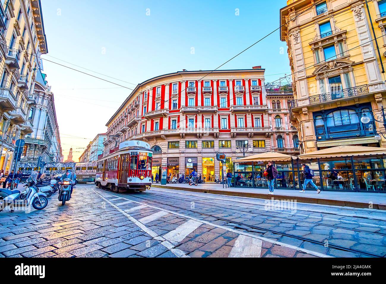 MILAN, ITALY - APRIL 5, 2022: The old vintage tram rides along Via Dante street in central district, on April 5 in Milan, Italy Stock Photo