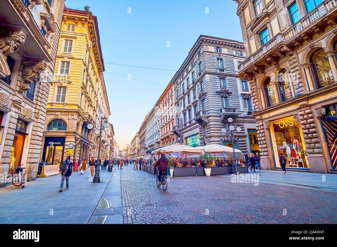MILAN, ITALY - APRIL 5, 2022: Walk along Via Dante, one of the popular shopping areas of the city, on April 5 in Milan, Italy Stock Photo