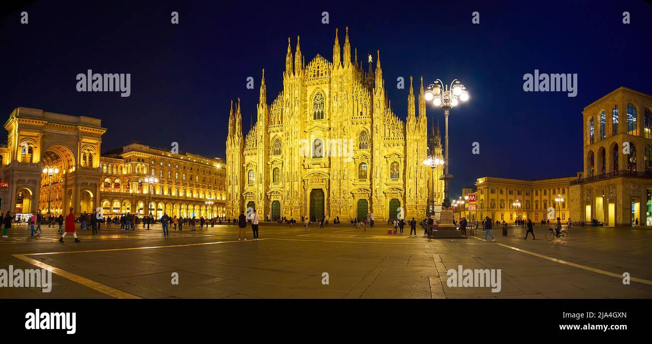 MILAN, ITALY - APRIL 5, 2022: Duomo di Milano with Galleria Vittorio Emanuele II at night, on April 5 in Milan, Italy Stock Photo