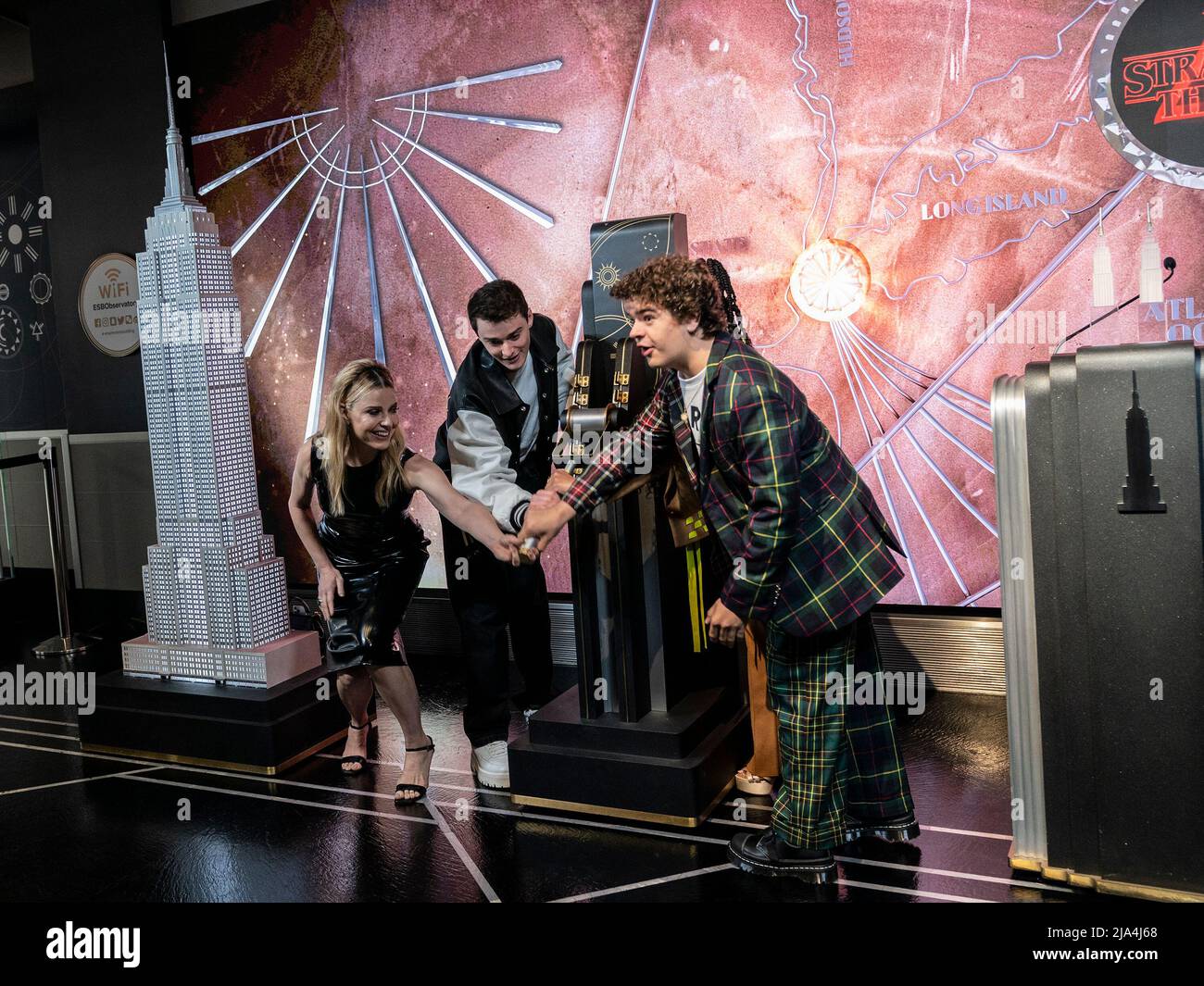 New York, United States. 26th May, 2022. Cara Buono, Noah Schnapp, Priah Ferguson, Gaten Matarazzo from Stranger Things attends ceremonial lighting of Empire State Building ahead of global event for season 4 premiere. (Photo by Lev Radin/Pacific Press) Credit: Pacific Press Media Production Corp./Alamy Live News Stock Photo