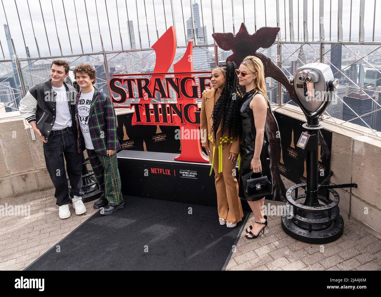 New York, United States. 26th May, 2022. Noah Schnapp, Gaten Matarazzo, Priah Ferguson, Cara Buono from Stranger Things attend ceremonial lighting of Empire State Building ahead of global event for season 4 premiere. (Photo by Lev Radin/Pacific Press) Credit: Pacific Press Media Production Corp./Alamy Live News Stock Photo