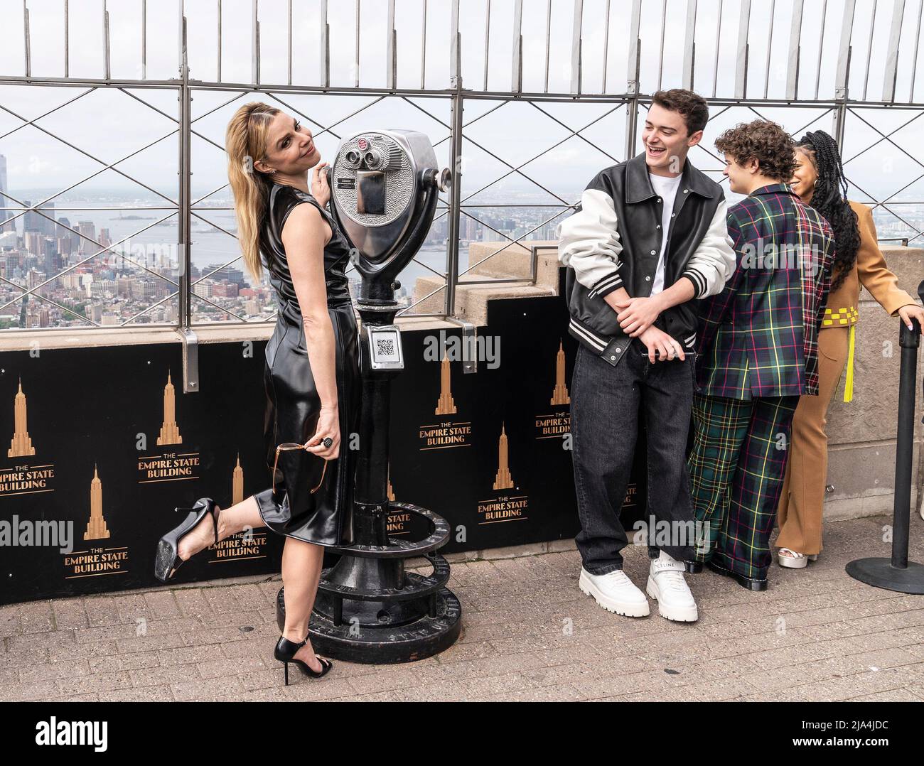 New York, United States. 26th May, 2022. Cara Buono, Noah Schnapp, Gaten Matarazzo, Priah Ferguson from Stranger Things attend ceremonial lighting of Empire State Building ahead of global event for season 4 premiere. (Photo by Lev Radin/Pacific Press) Credit: Pacific Press Media Production Corp./Alamy Live News Stock Photo
