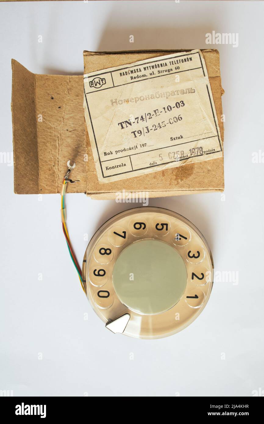 Vintage phone ring with the box. Landline, old phone ring spare part. Retro phone with numbers. Vintage soviet electronic repair part from 1970-1990. Stock Photo