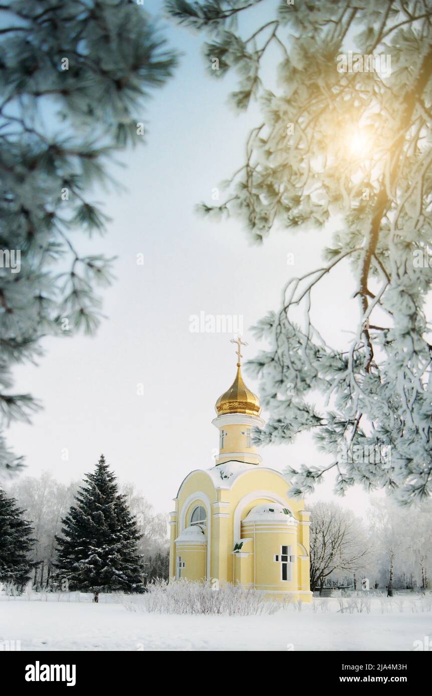 Christian orthodox church golden domes under clear blue sky Stock Photo