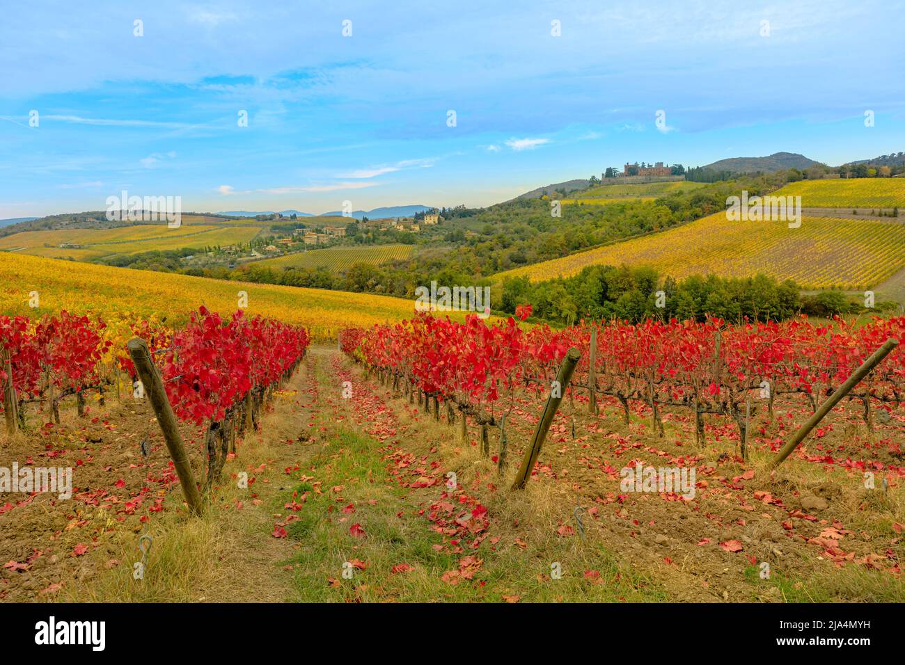 Autumn landscape of the brolio Castle with Chianti vineyards in Tuscany. Winegrowing Radda in Chianti town in Italian countryside. Tuscan autumn red Stock Photo
