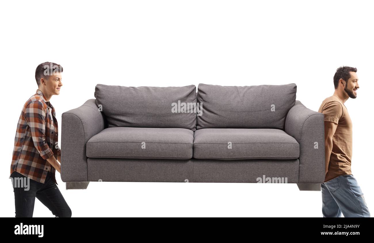 Two guys carrying a gray sofa isolated on white background Stock Photo