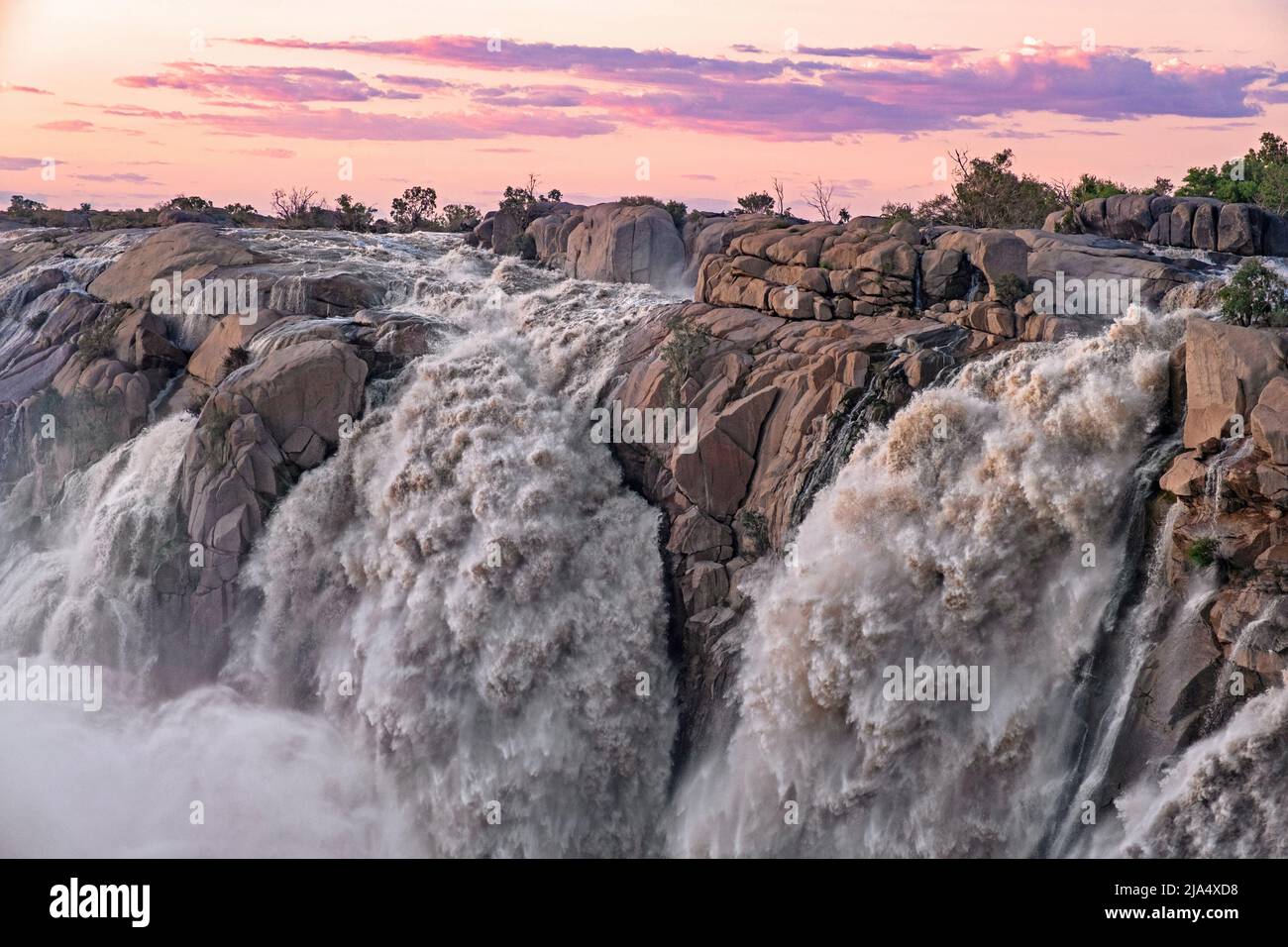 Waterfall on the Orange River in the Augrabies Falls National Park at sunset, Northern Cape Province, South Africa Stock Photo