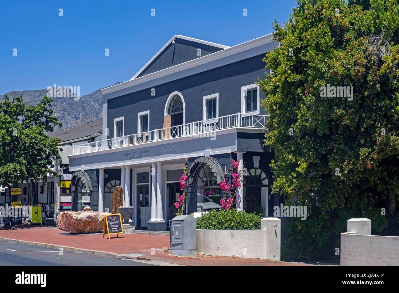 Galleries, stores and wine shops in main street of the town Franschhoek