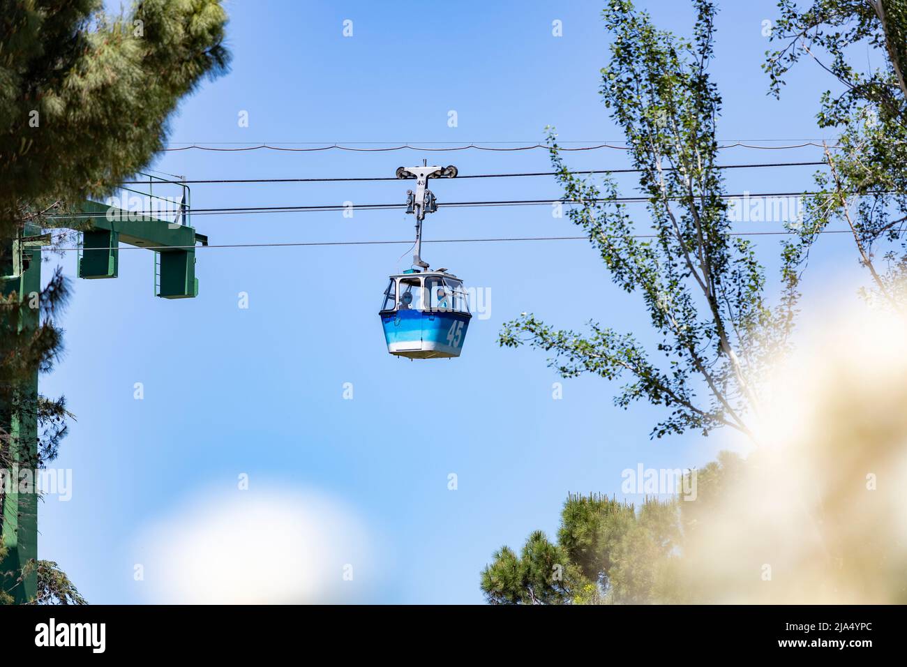 Cableway. Cable car in Madrid that connects the Parque del Oeste with the Casa de Campo in Madrid. Clear day with a blue sky, in Spain. Europe. Photo Stock Photo