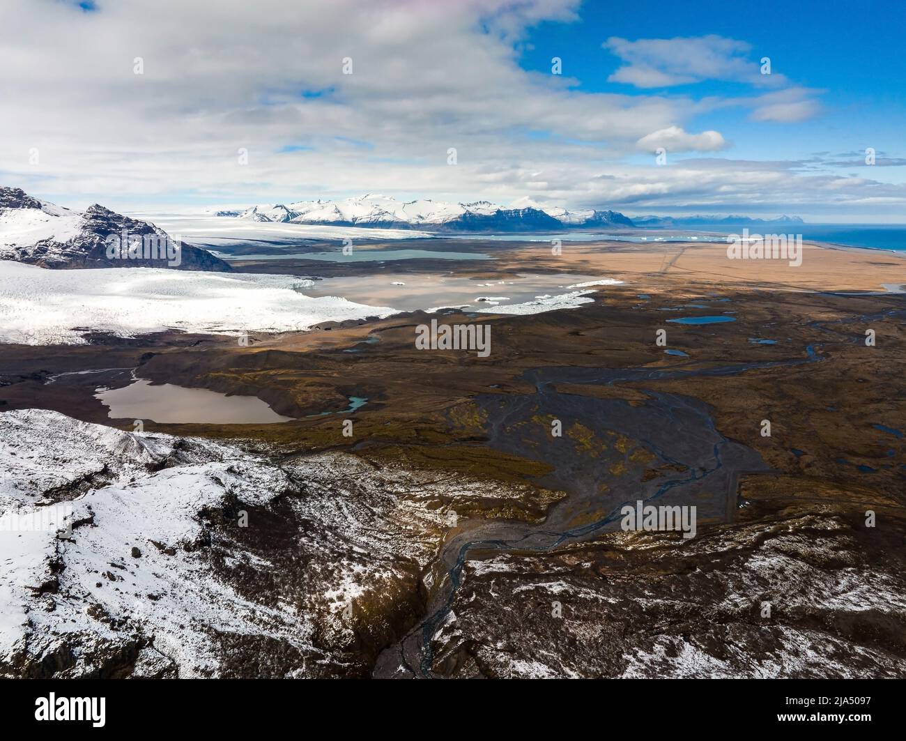 Aerial view of the glaciers and snowy mountains in Iceland Stock Photo ...