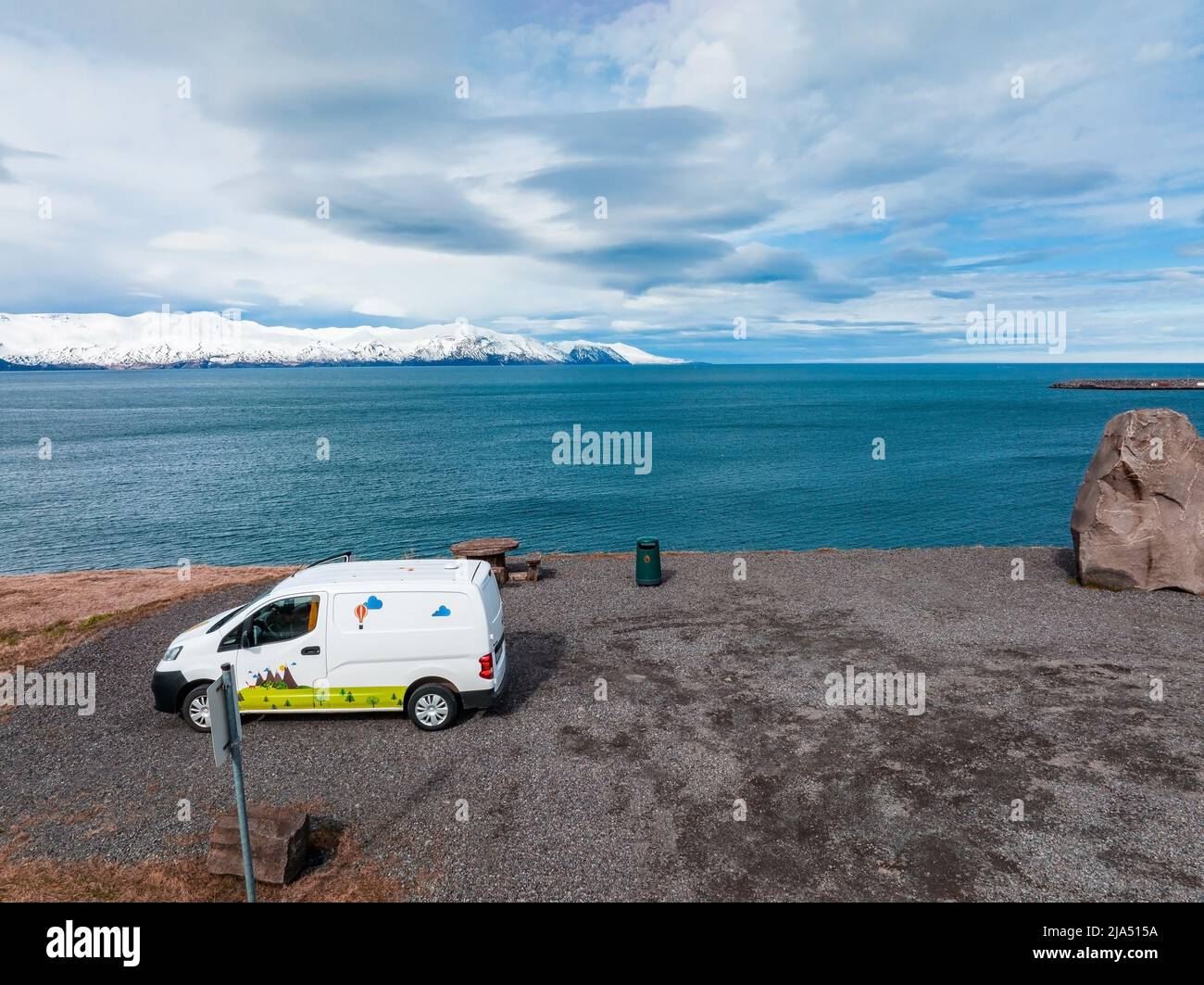 Camper van in Iceland parked by the side of the road in a beautiful