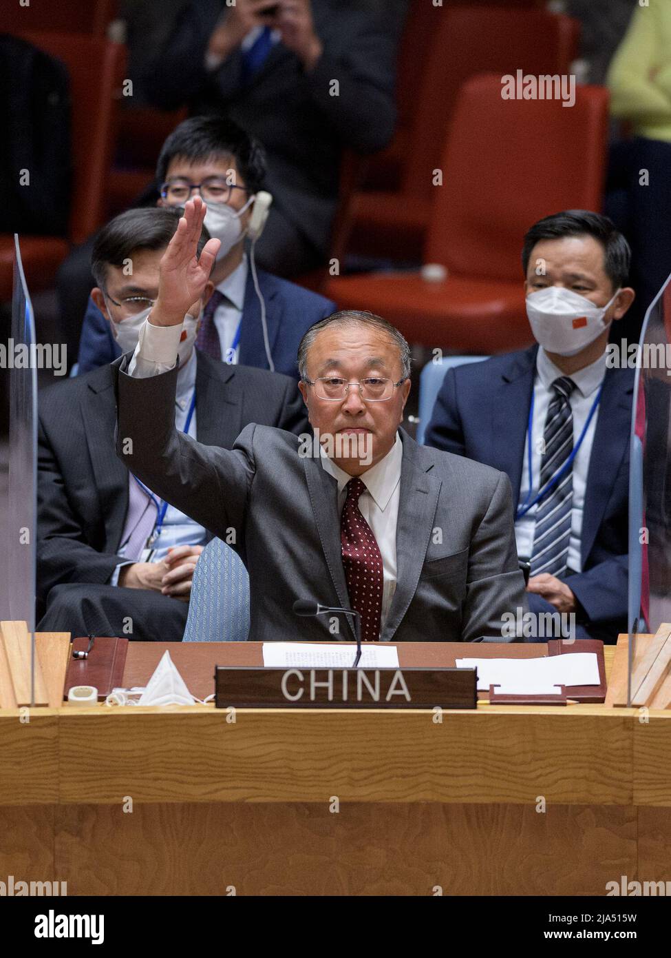 (220527) -- UNITED NATIONS, May 27, 2022 (Xinhua) -- Zhang Jun, China's permanent representative to the United Nations, raises his hand to veto a UN Security Council draft resolution aimed to impose new sanctions on the Democratic People's Republic of Korea (DPRK), at the UN Headquarters in New York, on May 26, 2022. (Manuel Elias/UN Photo/Handout via Xinhua) Stock Photo