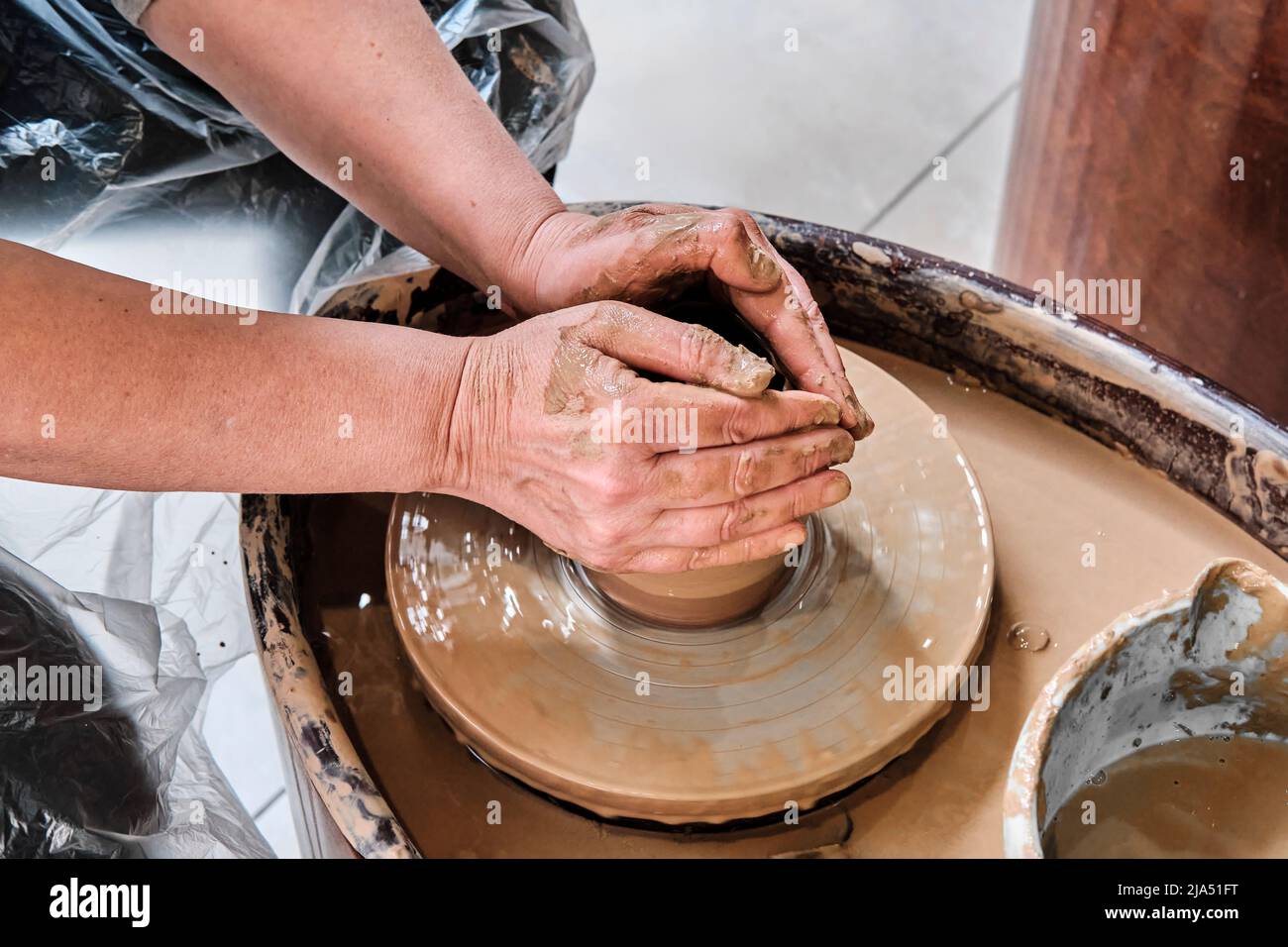 Artisan Making Pottery, Sculptor from Wet Clay on Wheel. Making Ceramic  Dishes. Close-up. Stock Image - Image of potty, pottery: 201259479
