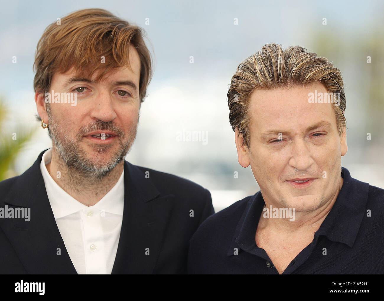 Cannes, France. 27th May, 2022. Spanish director Albert Serra (L) and French actor Benoit Magimel pose during a photocall for the film 'Pacifiction' during the 75th edition of the Cannes Film Festival in Cannes, southern France, on May 27, 2022. Credit: Gao Jing/Xinhua/Alamy Live News Stock Photo
