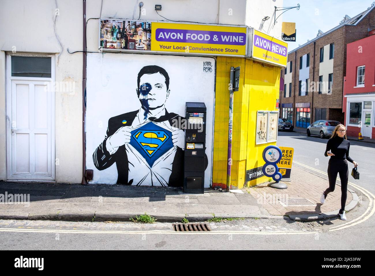 Bristol, UK. 27th May, 2022. Artwork created for the Upfest 2022 festival by UK artist Karl Read depicting Volodymyr Zelenskyy, President of Ukraine as Superman is pictured on the streets Bedminster, Bristol. The artwork was vandalised before the festival started. The Upfest festival is Europe's largest Street Art & Graffiti festival. Credit: Lynchpics/Alamy Live News Stock Photo