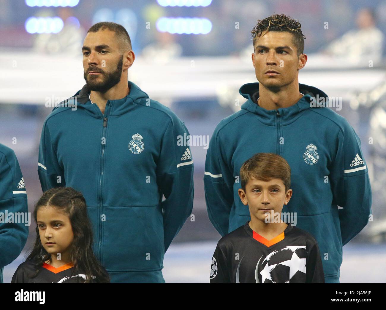 KYIV, UKRAINE - MAY 26, 2018: Real Madrid players (Karim Benzema and Cristiano Ronaldo) listen to Champions League Anthem before the UEFA Champions League Final 2018 game against Liverpool Stock Photo