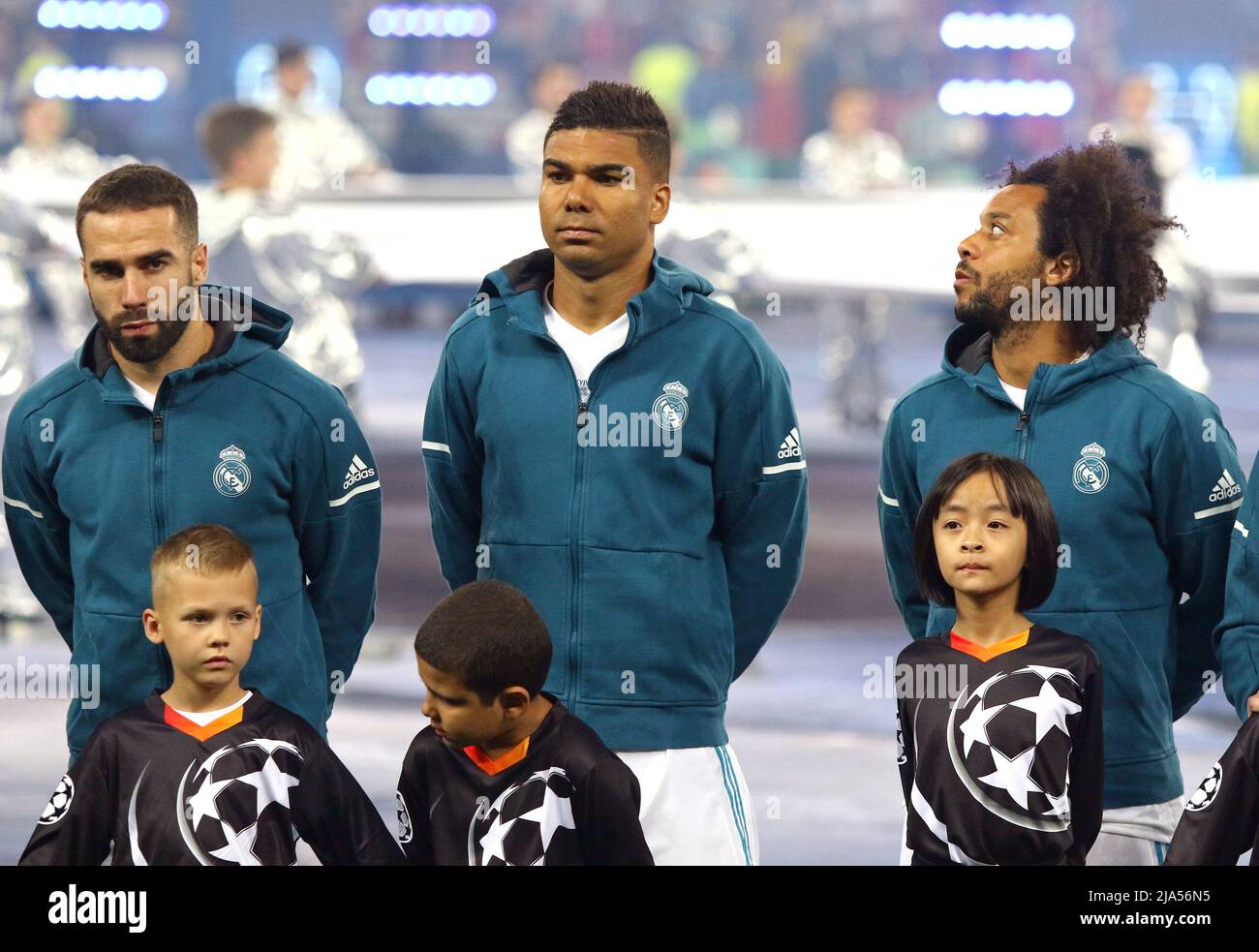 KYIV, UKRAINE - MAY 26, 2018: Real Madrid players (Dani Carvajal, Casemiro and Marcelo) listen to Champions League Anthem before the UEFA Champions League Final 2018 game against Liverpool Stock Photo