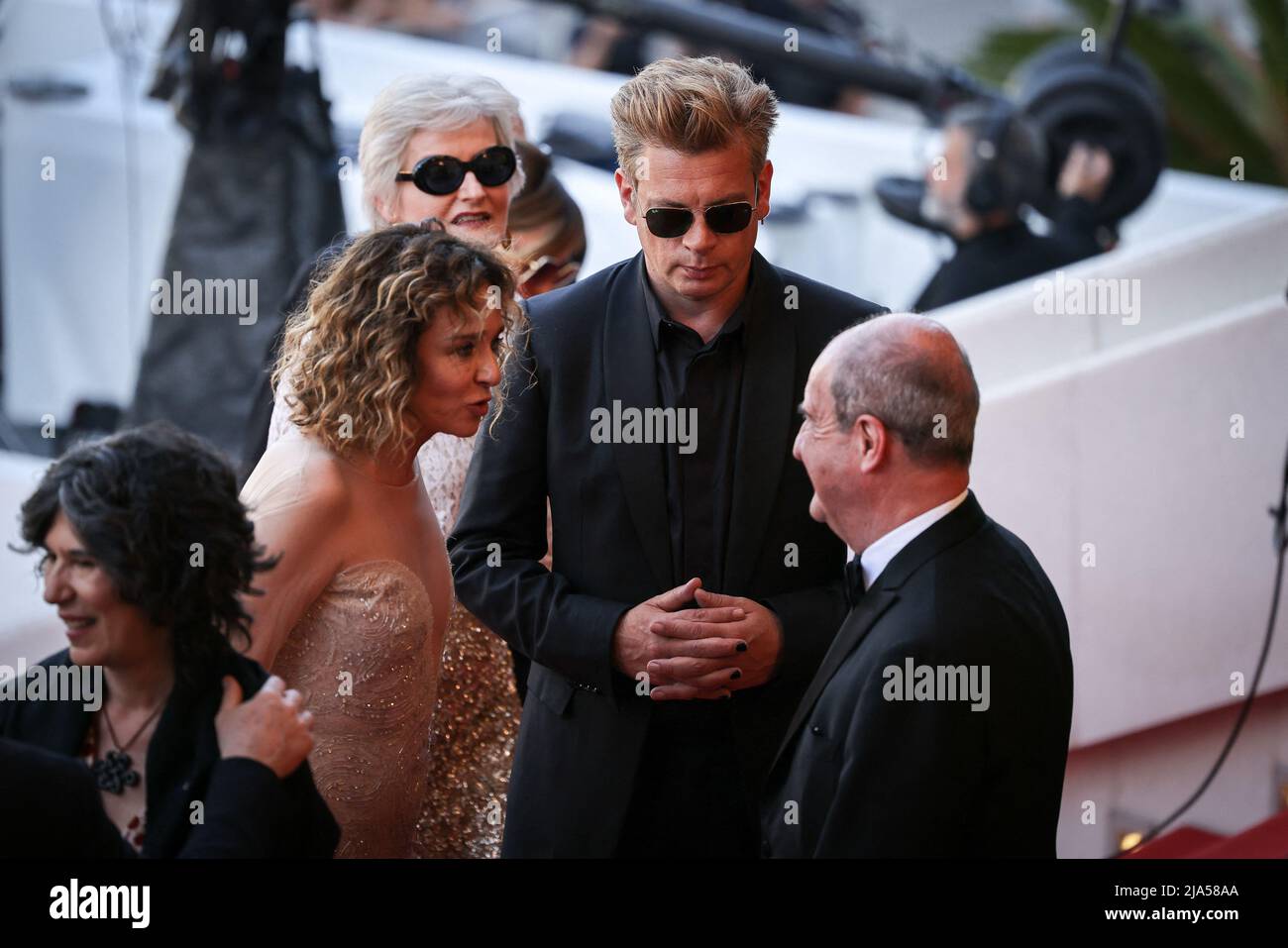 President of the Un Certain Regard Jury Valeria Golino, Member of the Un Certain Regard Jury, Benjamin Biolay speak to Pierre Lescure on the red carpet during the screening of 'Mother And Son (Un Petit Frere)' as part of the 75th annual Cannes film festival at Palais des Festivals on May 27, 2022 in Cannes, France. Photo by David Boyer/ABACAPRESS.COM Stock Photo